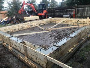 Abbotsford excavator services working at home